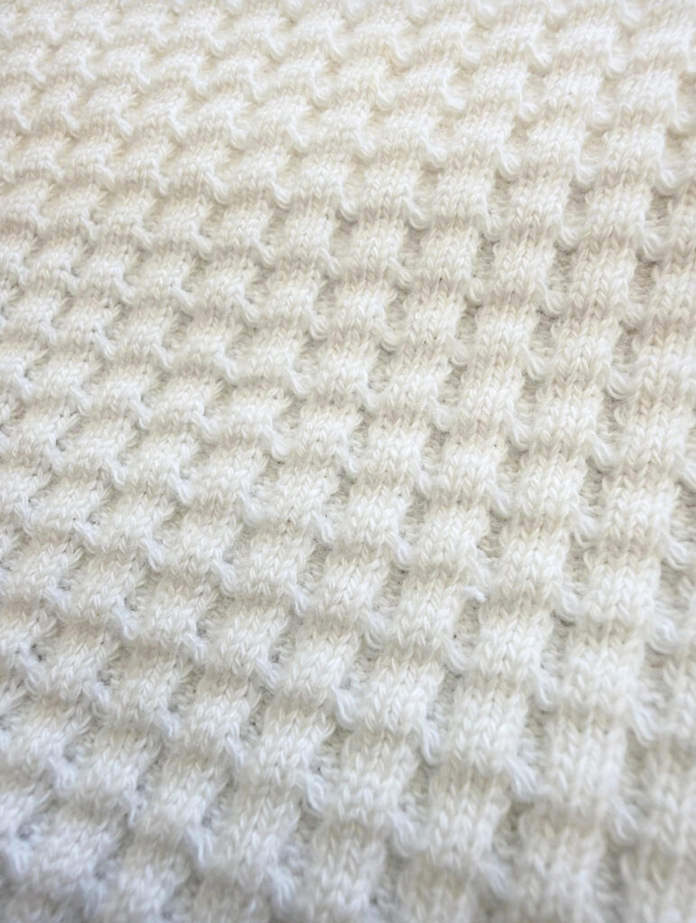 White waffle knit thermal fabric close-up